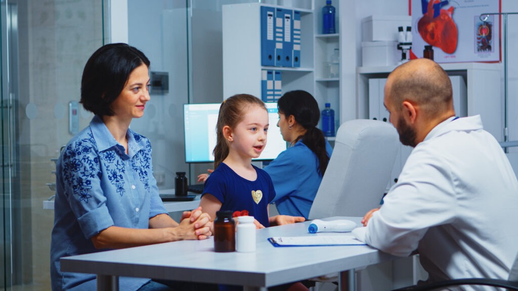 Doctor Giving High Five with Little Patient